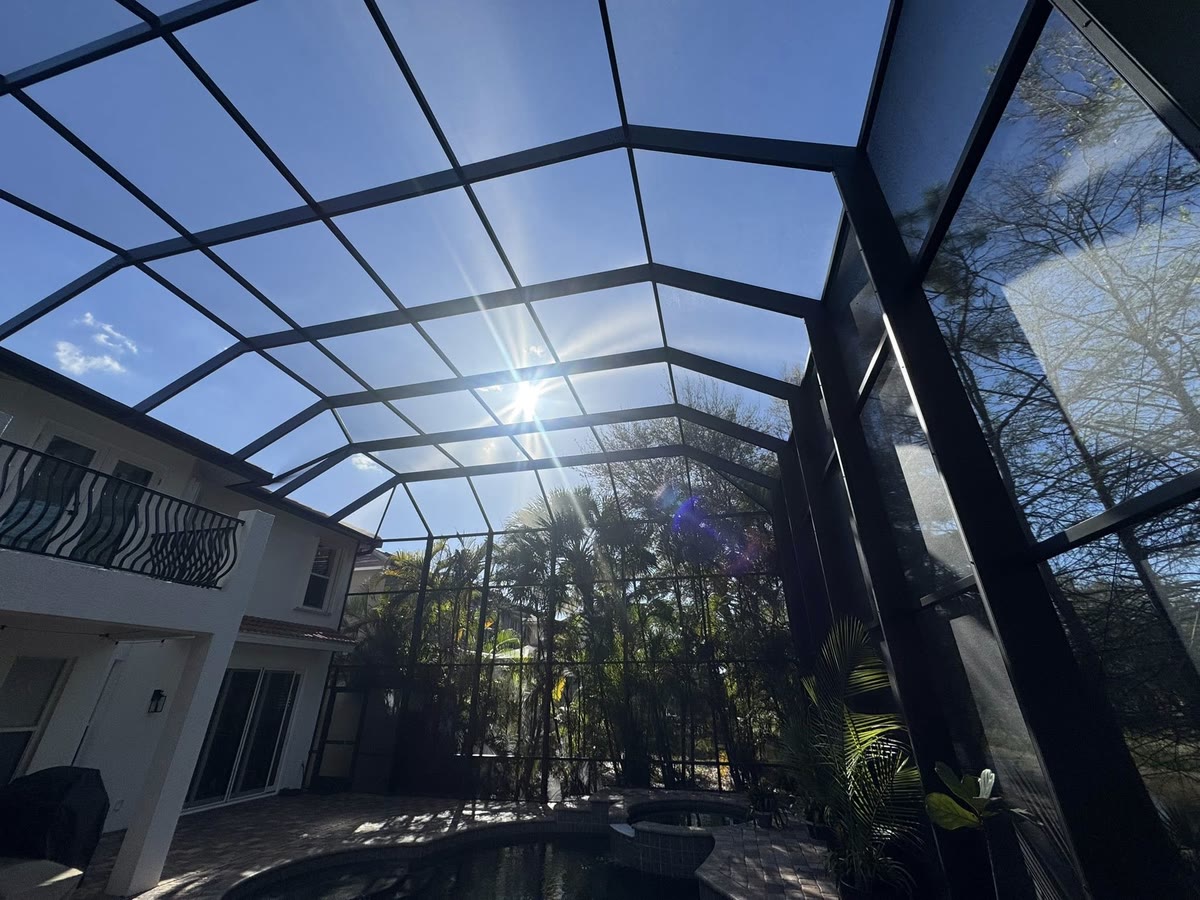 Looking up into a two-storey cage beside a house balcony during a refurbish.